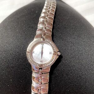 ESQ Woman’s Stainless Steel Silver Diamond Bezel Watch. Excellent o.